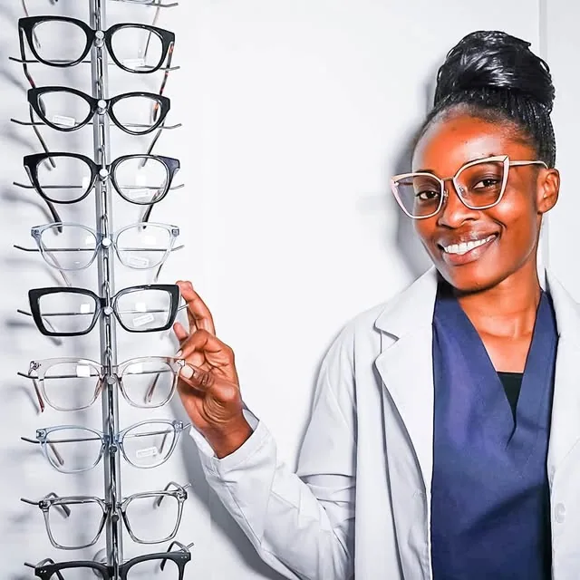 New Life Eye Care and Optical staff displaying spectacle frames